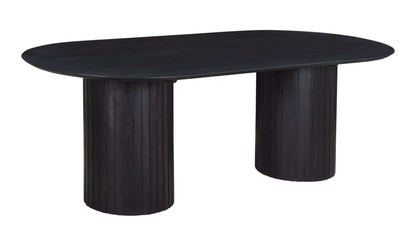 Black oval dining table with ribbed pillars, made of solid acacia wood.