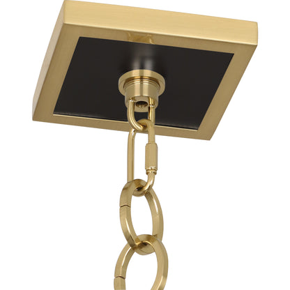 Close-up of Ranger Pendant Light ceiling mount in matte black with modern brass accents.