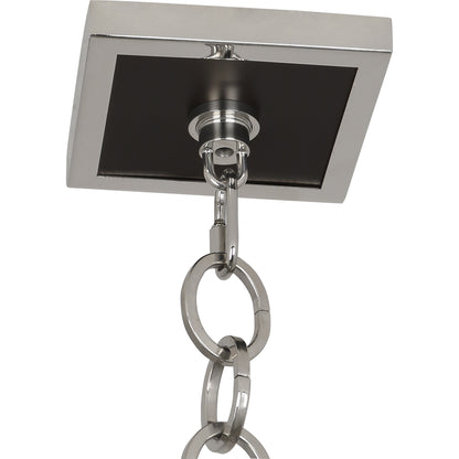 Close-up of Ranger Pendant Light ceiling mount in polished nickel with matte black accents.