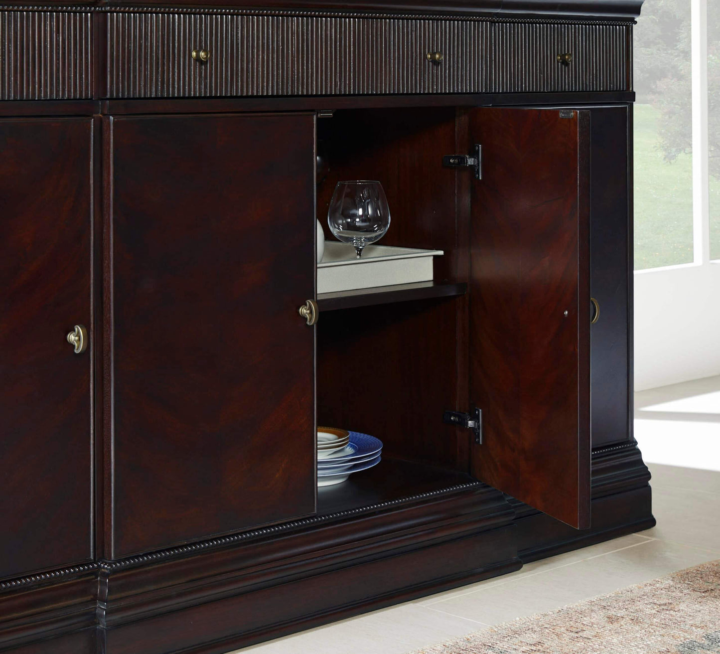 Close-up of the Revival Credenza storage compartments, highlighting the felt-lined lift-top and adjustable shelves.