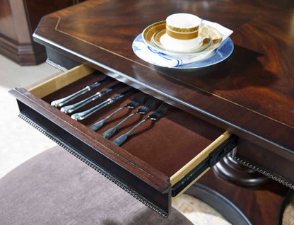  Close-up of the felt-lined drawer on the Revival Dining Table, perfect for storing dining essentials.