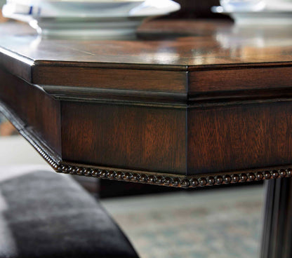  Detail view of the canted corners and beaded trim apron of the Revival Dining Table.