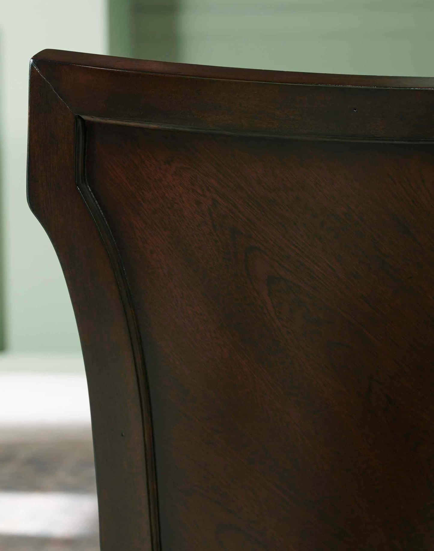 Close-up of the mahogany wood back detailing on the Revival Traditional Upholstered Dining Chair, emphasizing its craftsmanship and quality.