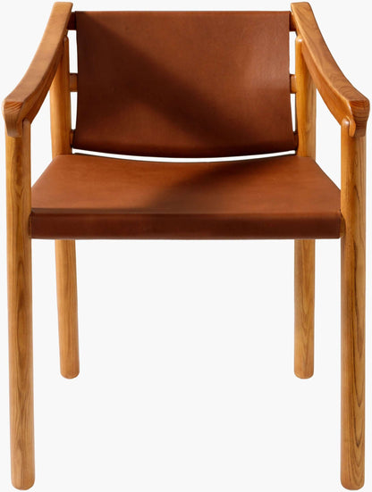 Front view of the Raymond Dining Chair showing the comfortable leather seat and ergonomic design.