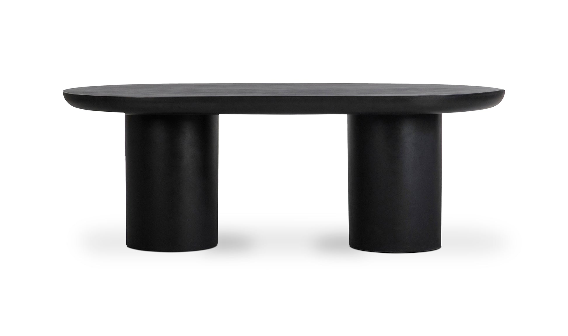 Front view of the Rocca black concrete dining table, showcasing its monolithic twin pillar design.