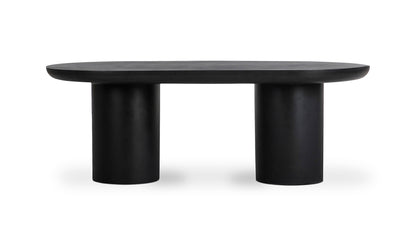 Front view of the Rocca black concrete dining table, showcasing its monolithic twin pillar design.