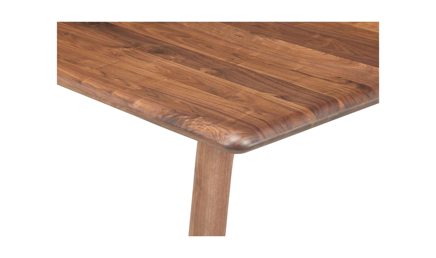 Detailed View of the Malibu Dining Table's Walnut Wood Grain