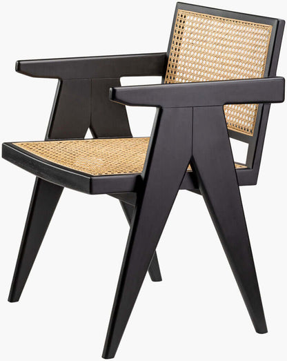 Side view of Surya Hague Dining Arm Chair in black, highlighting the rattan seat and backrest.