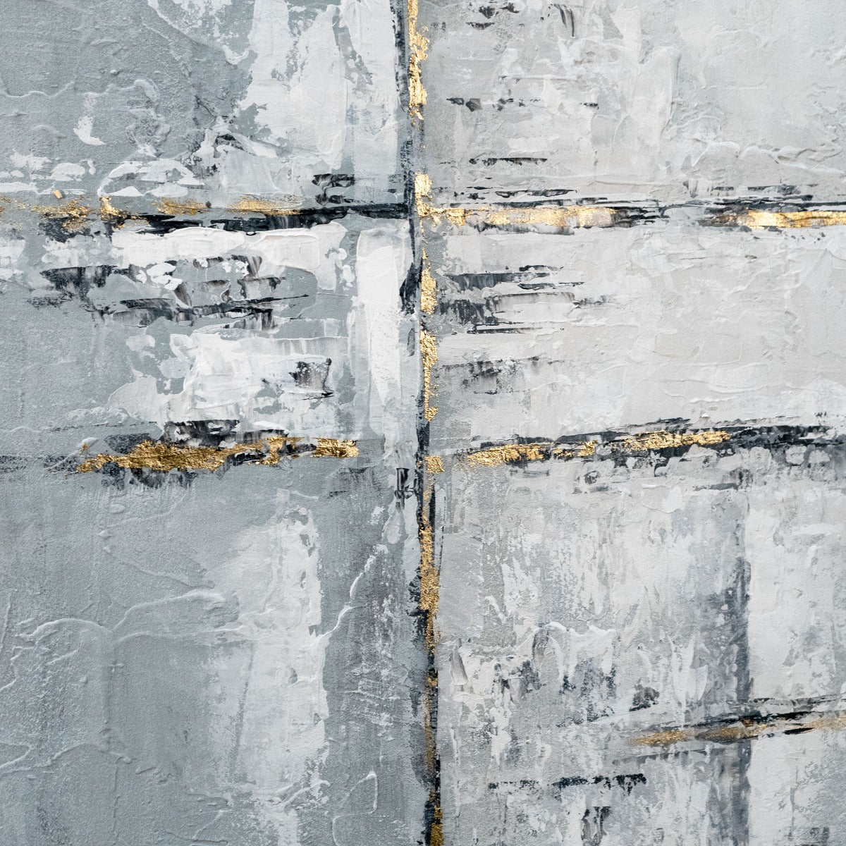 Detailed shot of gold leaf accents on grey textured abstract painting