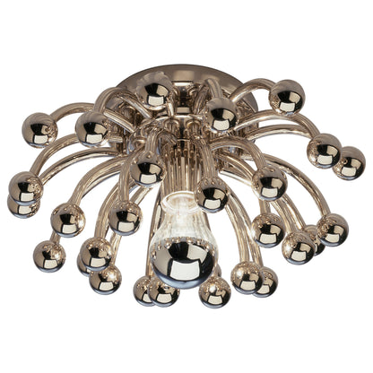 Close-up of small Anemone Flushmount, highlighting curved arms, polished nickel finish, and single silver-tipped bulb.