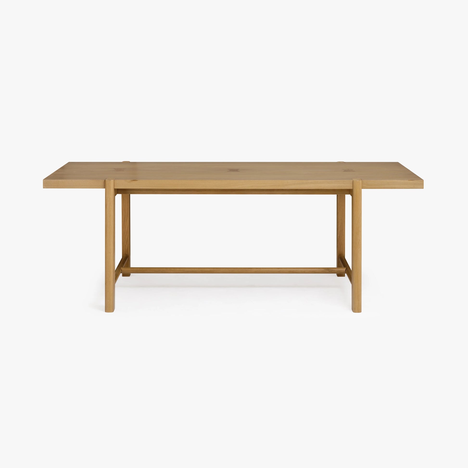 Front view of the Soren Oak Dining Table showcasing solid oak in a light finish.