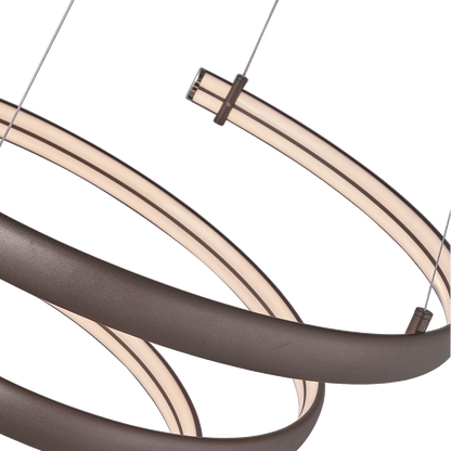 Oval spring pendant light bronze finish left side glow.