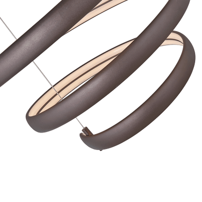 Oval spring pendant light bronze finish right side glow.