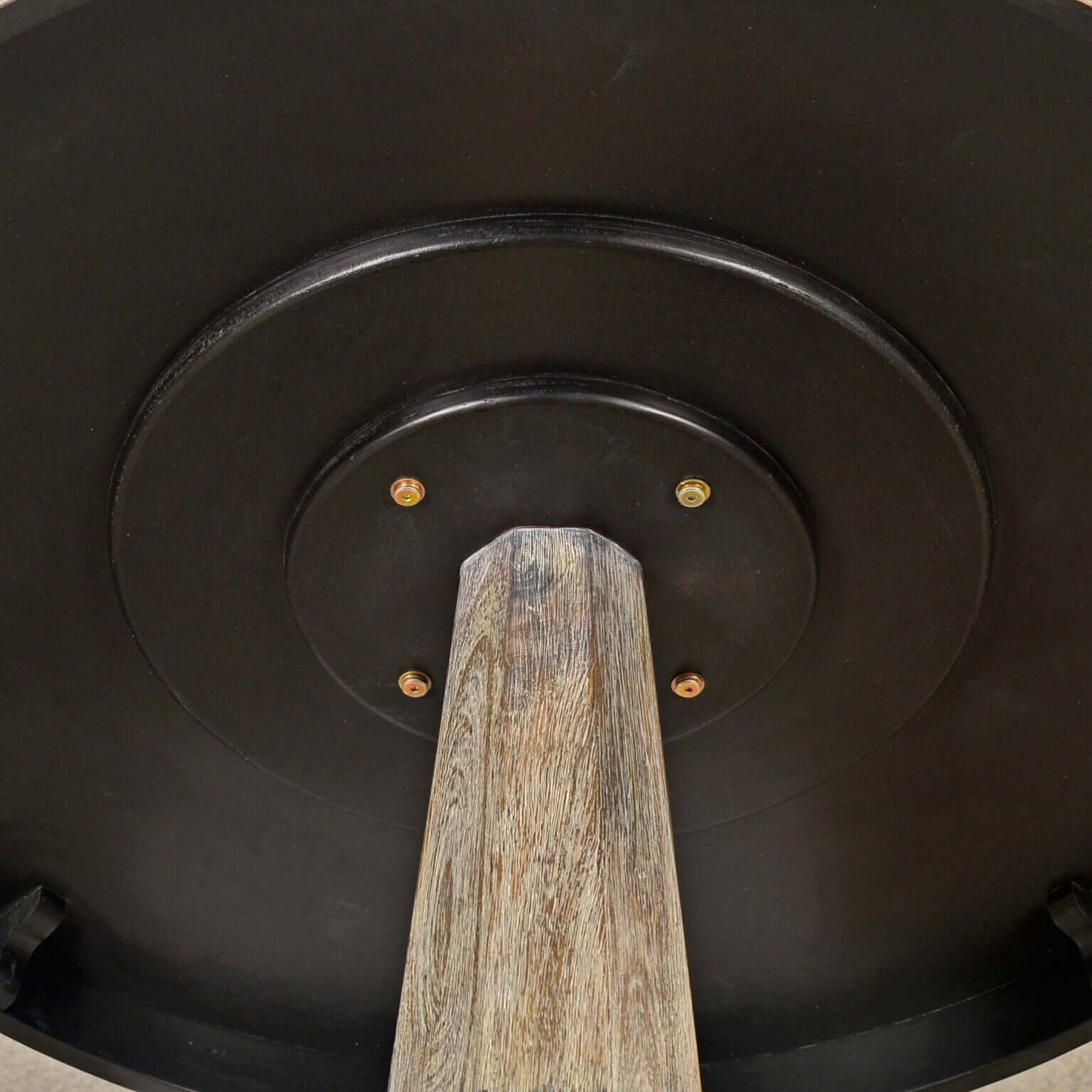 Detailed view of the Lancaster Dining Table's pedestal base and leg connection.