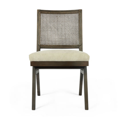 Front view of a contemporary dining chair featuring a cane back and plush upholstered seat.